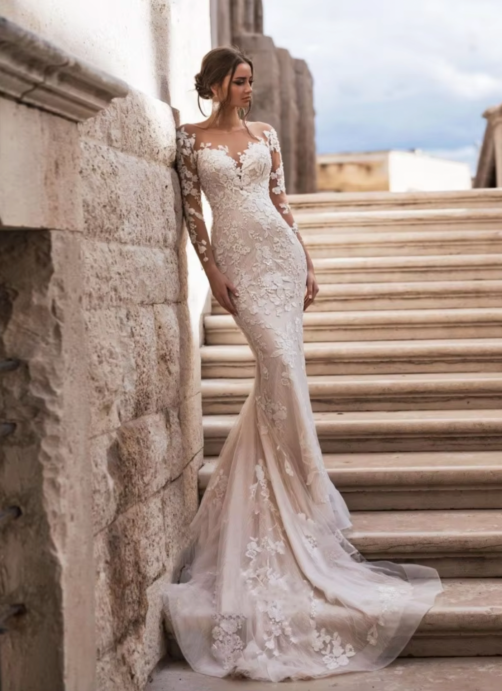 Elevate your special day with our Robe Papina. This elegant white dress is delicately embroidered, perfect for a romantic wedding. Make a statement and feel like a bride in this stunning gown. Say 'I do' to Robe Papina.