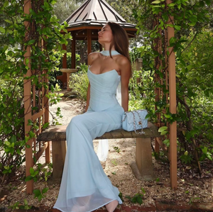 Elevate your style with the Bluebell Set. A stunning 2-piece ensemble for women featuring an elegant strapless bodycon top and a long maxi skirt. Perfect for formal occasions and wedding guest events. Make a statement with this luxurious and exclusive set.