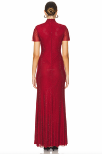 Indulge in pure elegance with the Red Rhinestone Maxi Dress by Self-Portrait! This stunning dress features a rhinestone-studded fishnet design that adds a liquid-like finish. The timeless mock neck and flared skirt create a statuesque silhouette, guaranteed to turn heads. Complete the look with our statement earrings for added sparkle.