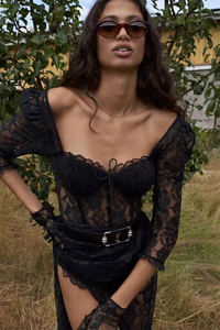 Indulge in luxury with our Robe Elisa - a stunning black lace dress. With intricate lace detailing, this dress exudes elegance and sophistication. Perfect for any occasion, this dress will make you feel like a true fashion icon. Elevate your wardrobe with our Robe Elisa.