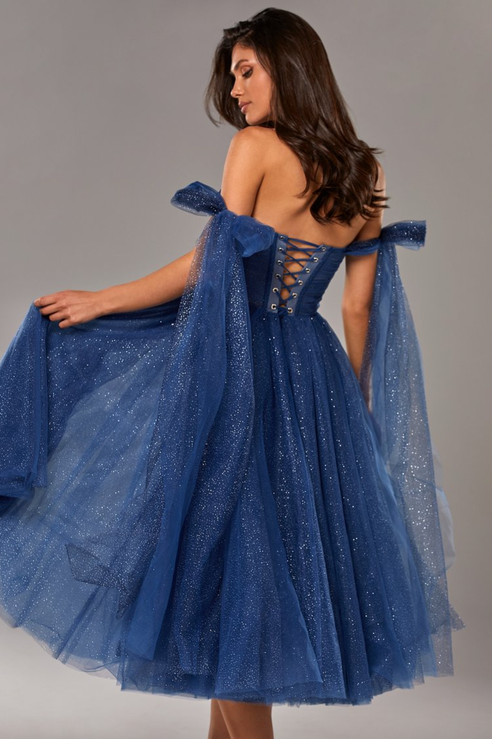 Step into the spotlight with our Robe Laren! This flattering royal blue sparkling cocktail dress will make you shine like a star. Perfect for those who love taking risks and standing out from the crowd. Get ready for a bold and adventurous look that will make heads turn!