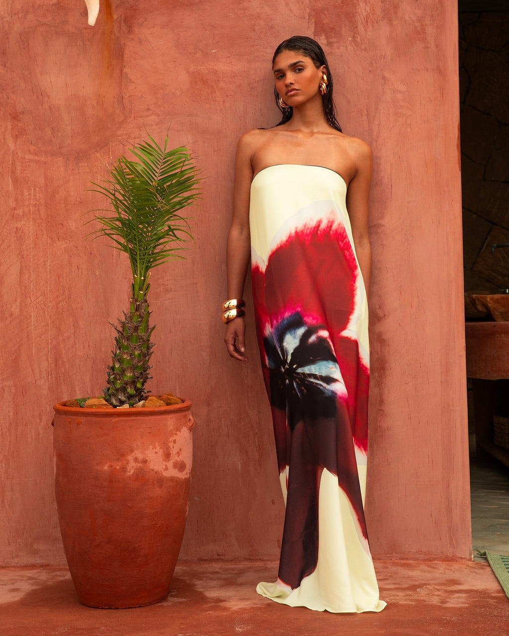 Indulge in the duality of femininity and toughness with the Antheia Maxi Dress. With its sleek silhouette and tough leather belt strap, make a bold statement. The vibrant colors of the orchid print add a touch of sensuality to this edgy piece. Elevate your style to new heights.