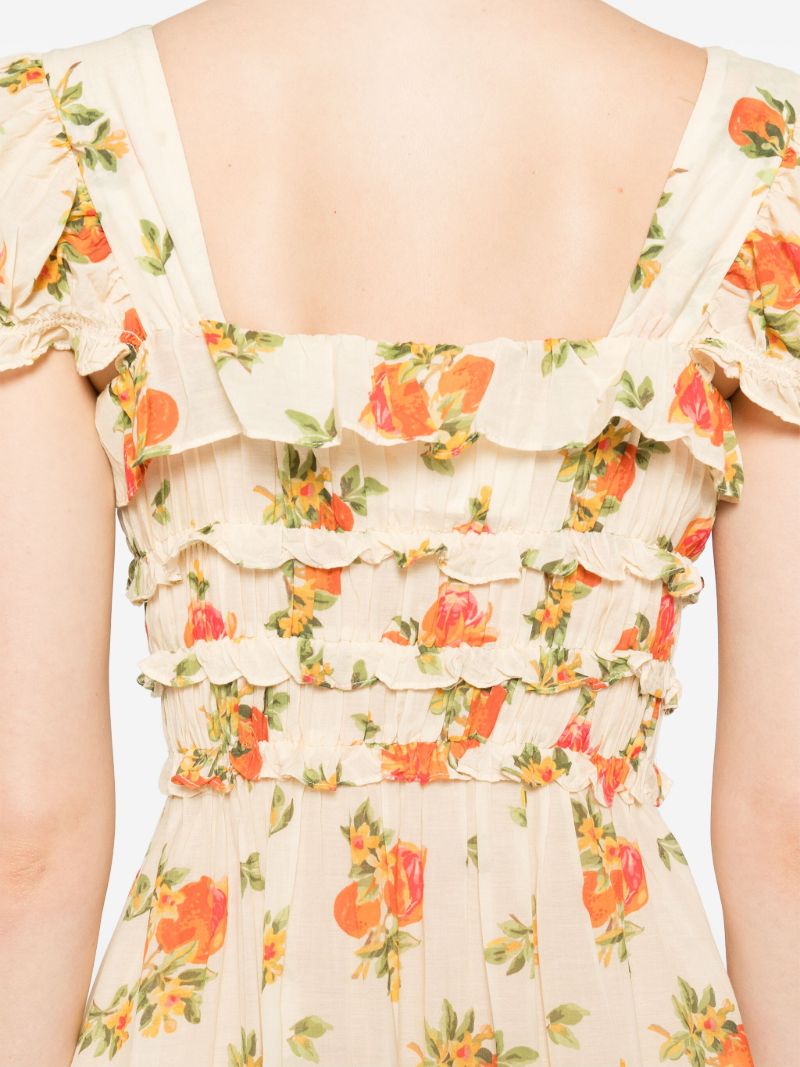 The Clarinet Floral-Print Midi Dress by Doen features a pale yellow floral print, a square neck, and short puff sleeves with elasticated cuffs. The smocked waist and bow detail at the front create a flattering silhouette. Perfect for adding a touch of spring to your wardrobe.