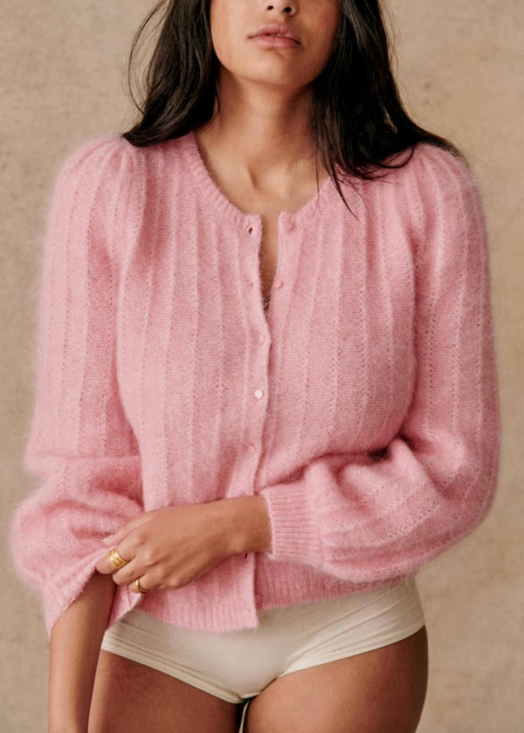 Expertly crafted from a luxurious blend of wool and super kid mohair, the Amance Cardigan is a stylish and cozy addition to your wardrobe. With its intricately patterned knit, round neckline, and tonal buttons, this long-sleeved cardigan offers both warmth and sophistication. Elevate your look with this timeless piece.