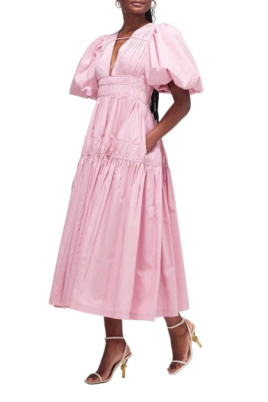 Elevate your special occasion look with the Fallingwater Ruched Midi Dress by AJE. Made from sweet 'Chalk Pink' cotton-poplin, this dress boasts a romantic and playful silhouette with voluminous puffed sleeves and a cinched waist. Rent now to make a stand-out statement!