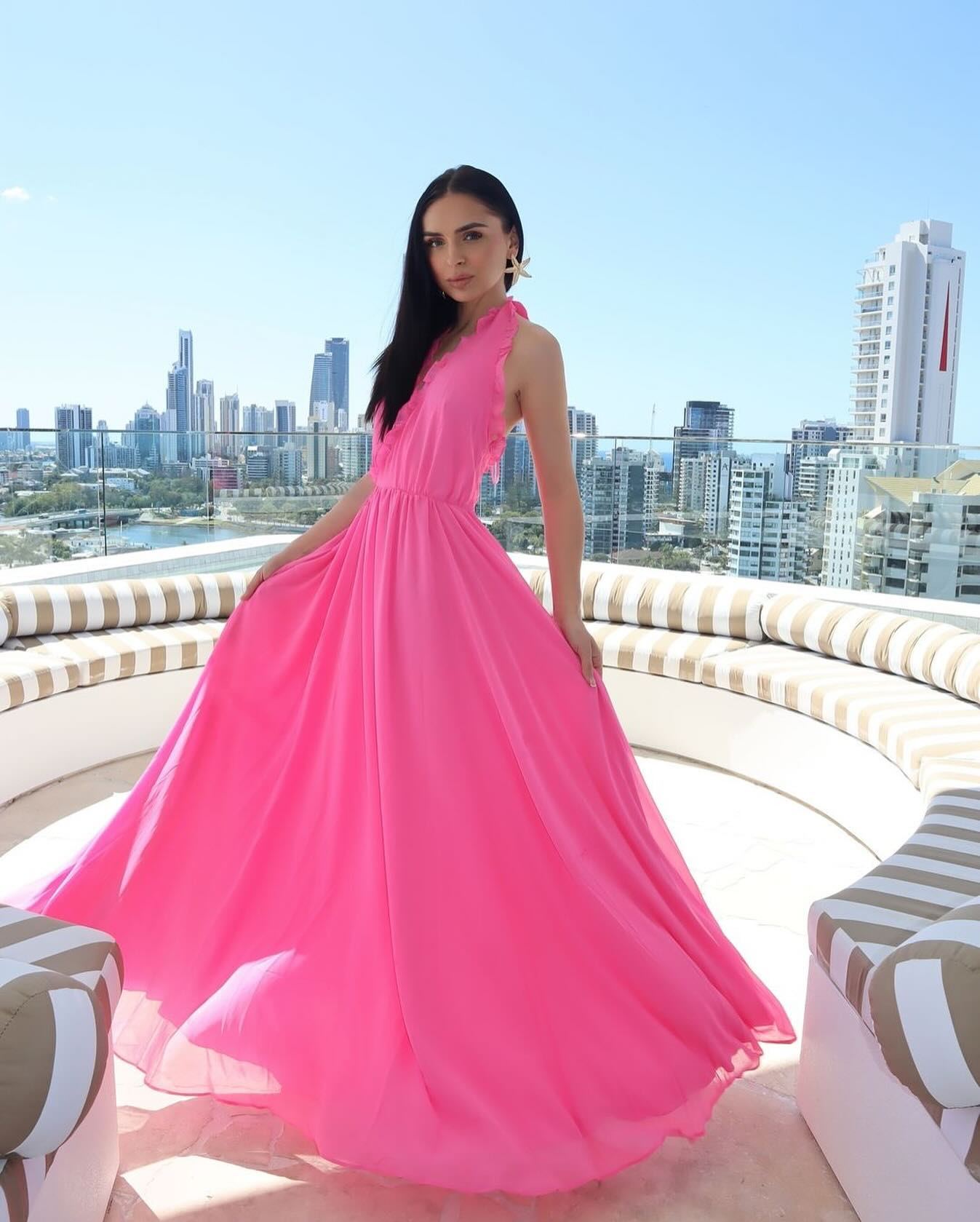 Elevate your style with the Susanna Dress. Its cross V-neckline and pleated edges add unique sophistication, while the bright pink georgette chiffon fabric and satin lining exude luxury. Perfect for weddings, parties, and summer outings, this flowing dress will make you feel like a true fashionista.