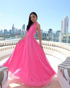 Elevate your style with the Susanna Dress. Its cross V-neckline and pleated edges add unique sophistication, while the bright pink georgette chiffon fabric and satin lining exude luxury. Perfect for weddings, parties, and summer outings, this flowing dress will make you feel like a true fashionista.