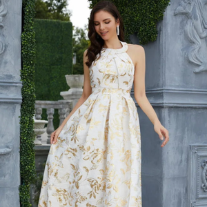 Elevate your style with the Eliza Ballgown Dress. This elegant gown boasts a long train fit for a princess, making you feel like royalty. Perfect for formal events, this dress is sure to turn heads and make a statement.