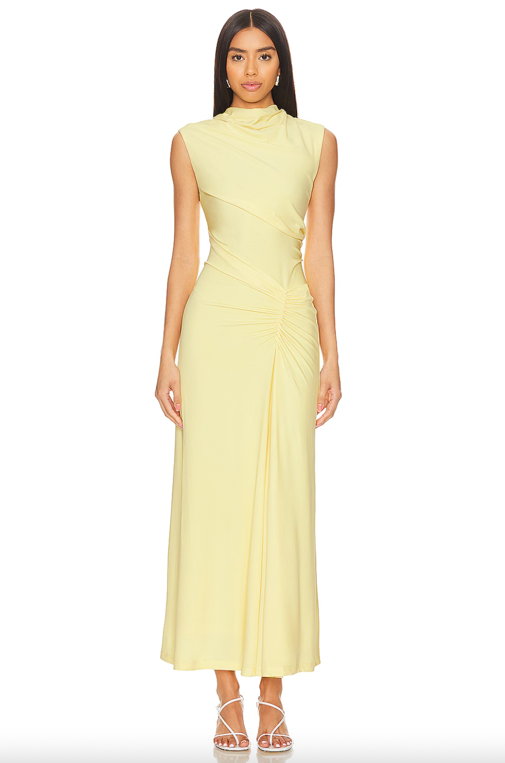 Indulge in effortless sophistication with the Acacia Dress by Simkhai. Crafted from draped jersey, this sleeveless midi boasts artful gathering and a fluid silhouette in a timeless Buttercream hue. Elevate any occasion with this understated yet elegant piece.