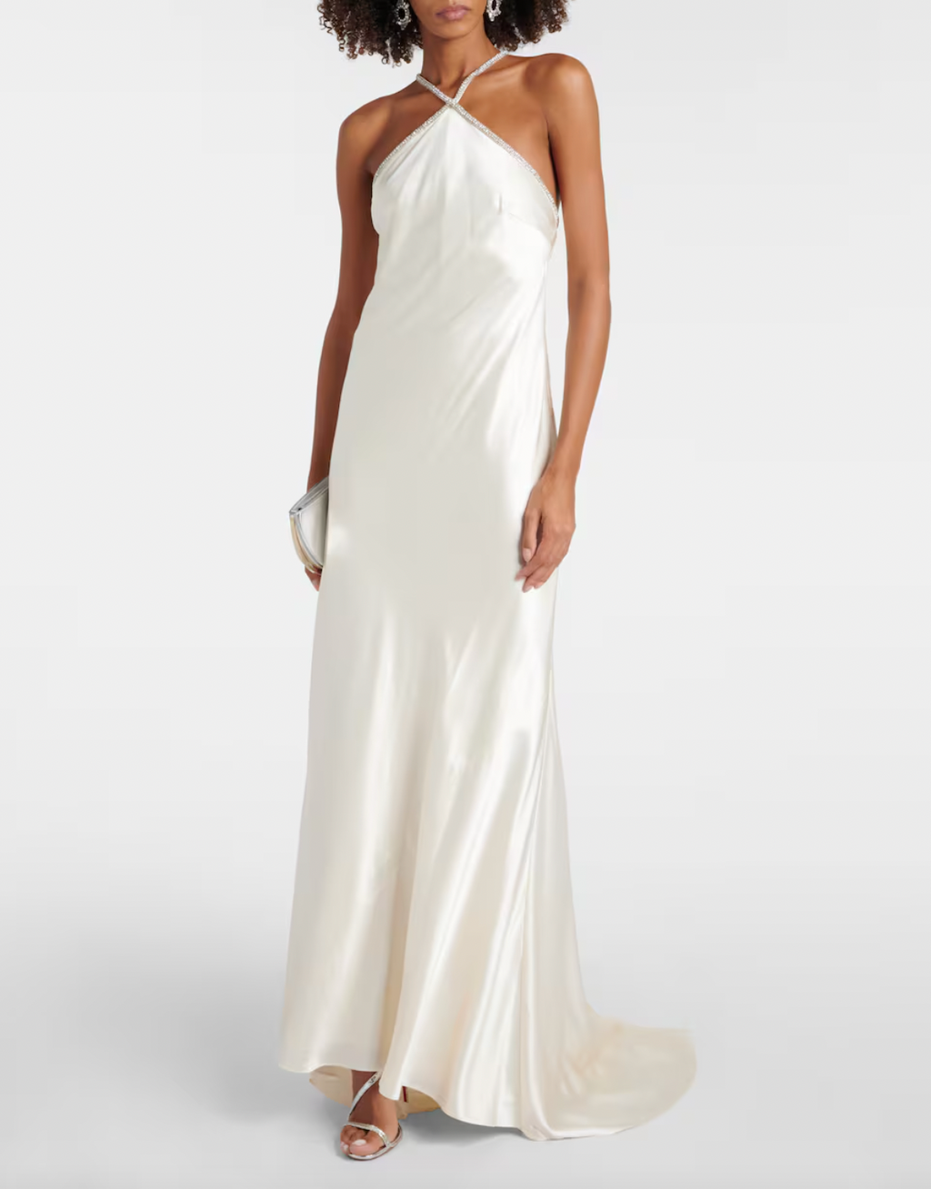 This Roland Mouret's Embellished Satin Gown exudes timeless sophistication. Made of luxurious silk satin, it features a stunning open back with lace-up detail and elegant A-Line silhouette. Perfect for any special occasion, this halter gown is designed to make you feel confident and beautiful.