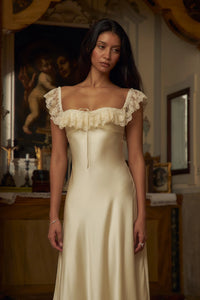 This elegantly designed Sonata Lady Length Dress features an off the shoulder neckline, adding a touch of femininity to your look. The bias cut of the dress and lace trim add a delicate and sophisticated touch. Designed for comfort and support, it includes silicone gripper elastic and boning on the upper bodice. Indulge in luxury and beauty with this dress!