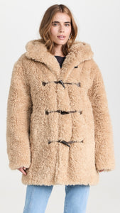 Introducing the must-have Faux-fur Hooded Coat by Marant Étoile. Crafted with a soft faux-fur exterior, this coat combines luxury and comfort. The classic hood and front toggle fastening add a timeless touch to the piece. With its beige hue and functional side pockets, it's a practical and stylish addition to any wardrobe. Worn by Emily in Paris.