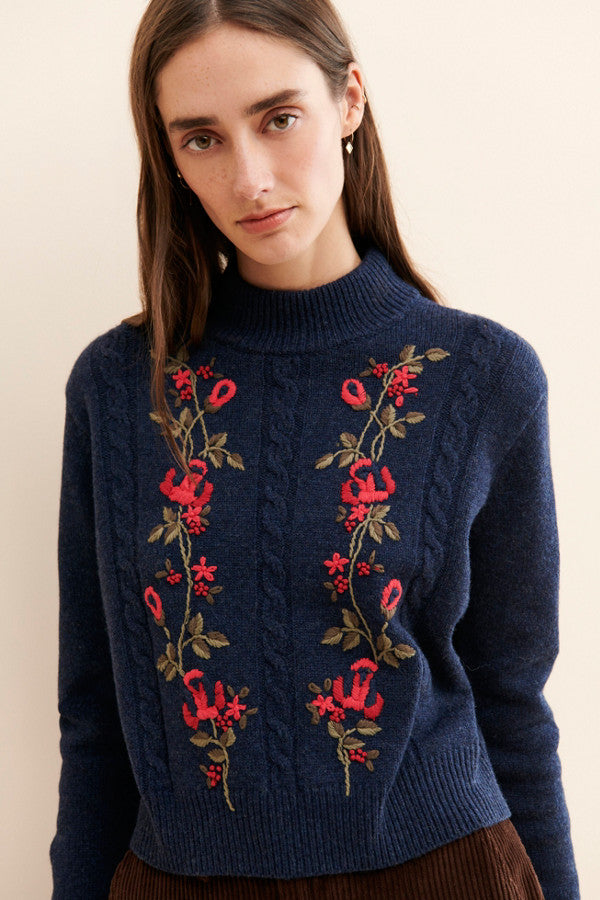 Presenting the Filbert Knit Sweater - a sophisticated and comfortable cable knit sweater adorned with exquisite floral embroidery. Crafted with a convenient pullover design for easy wearing. Stay fashionable and cozy with this essential garment.