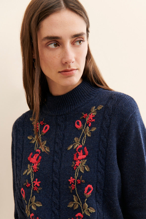 Presenting the Filbert Knit Sweater - a sophisticated and comfortable cable knit sweater adorned with exquisite floral embroidery. Crafted with a convenient pullover design for easy wearing. Stay fashionable and cozy with this essential garment.