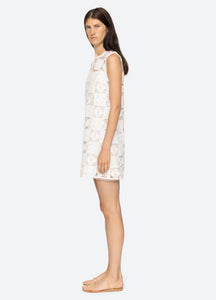 Experience elegance and beauty in the Melia Mini Dress by SEA NY. This luxurious tank dress features a delicate floral embroidered patchwork design that is both sophisticated and exclusive. Its mini silhouette adds a touch of playfulness, making it the perfect addition to your wardrobe for any occasion.