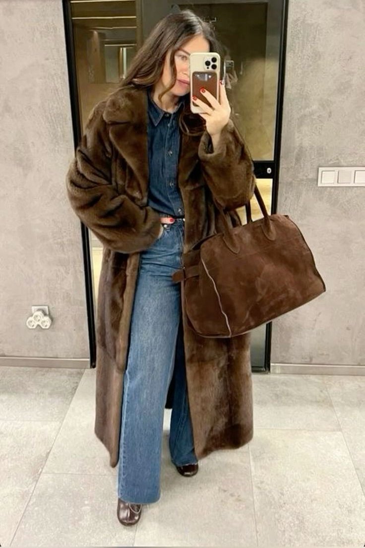 Elevate your style with the Daphne Shearling Coat. This faux fur masterpiece seamlessly blends textures and patterns for a luxurious and sophisticated aesthetic. The camel-colored coat not only adds warmth but also exudes opulence. Make a statement and elevate your wardrobe with this must-have piece.