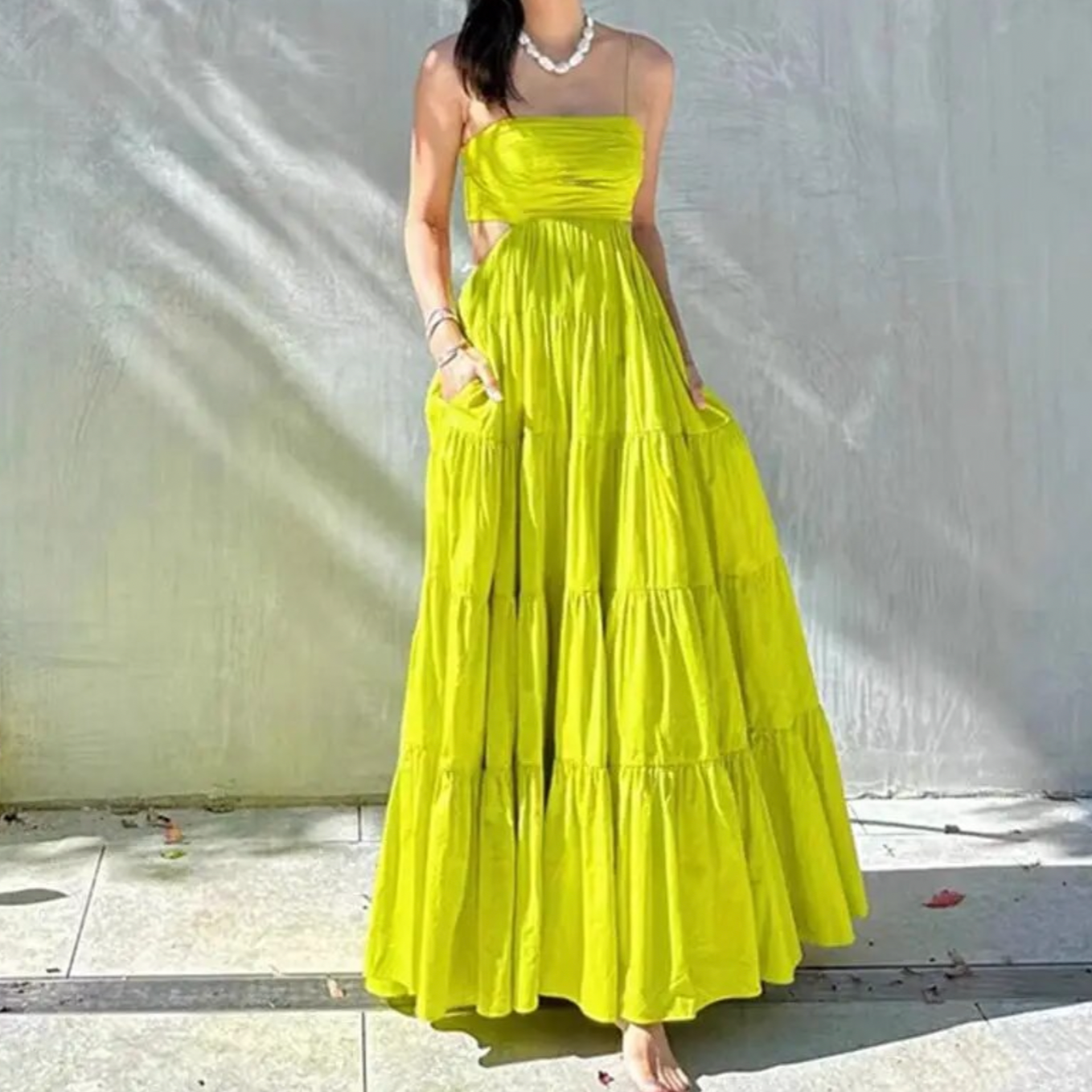 This stunning Aje Satre maxi dress is perfect for any summer occasion. Made of breathable cotton with a high waist, slash neck, and backless design, it offers both comfort and style. Dress it up or down for a versatile and chic addition to your wardrobe!