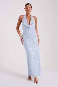 As a formal dress, the Blakely Maxi offers intricate sequin detailing and a halter neckline. Its ice blue color and glamorous design are perfect for any special event, instilling confidence and sophistication for the wearer.