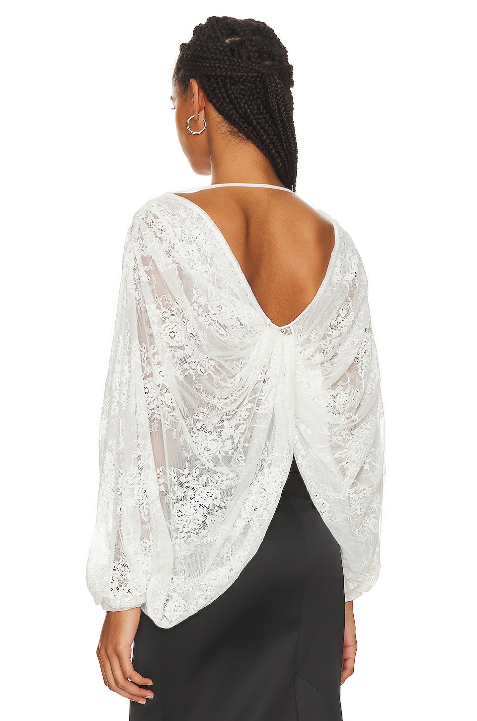 "Elevate your style with our Milk White Blouse Madeline. This sophisticated top boasts floral applique for a subtle, feminine touch and chic batwing sleeves. A must-have for any exclusive event or night out, this wrap lace top, handcrafted by Giussepe di morabito with %100 premium material, exudes luxury and class."