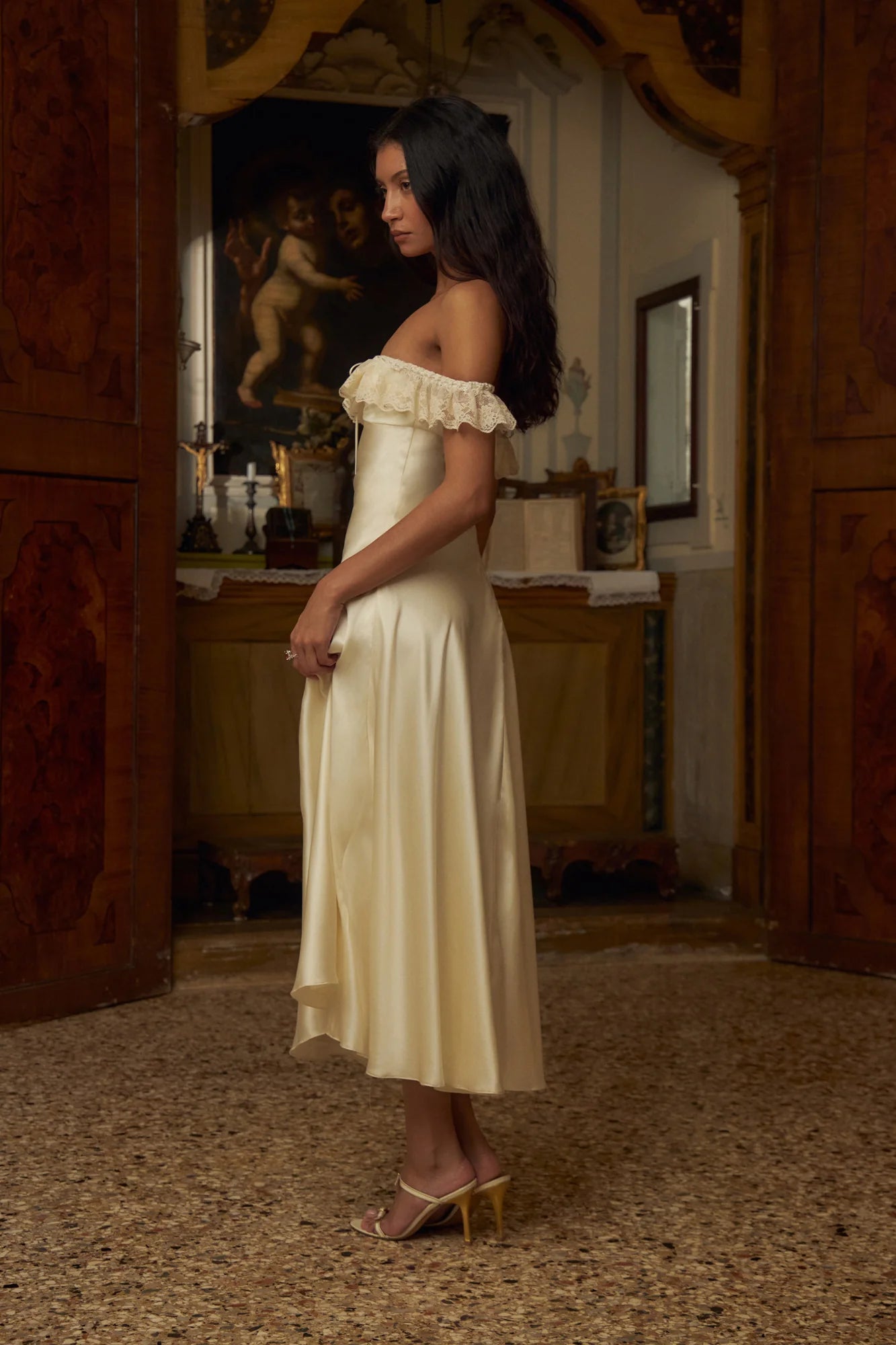 This elegantly designed Sonata Lady Length Dress features an off the shoulder neckline, adding a touch of femininity to your look. The bias cut of the dress and lace trim add a delicate and sophisticated touch. Designed for comfort and support, it includes silicone gripper elastic and boning on the upper bodice. Indulge in luxury and beauty with this dress!