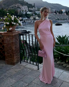 Elevate your style with the Fabienne Gown. Its one-shoulder design and adjustable strap detail give a sophisticated edge, while the stretch Cavalli fabric flawlessly hugs your curves. The contoured, full-length skirt and curved line details highlight your feminine silhouette. A versatile and elegant choice for any special occasion.