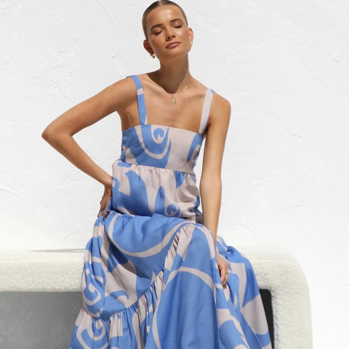 The Caprice Maxi Dress is the perfect dress for any beach party or summer holiday. Its vibrant and playful print will make a statement while its sleeveless and long design exudes elegance and charm. Stay on-trend and comfortable in this must-have fashion piece.