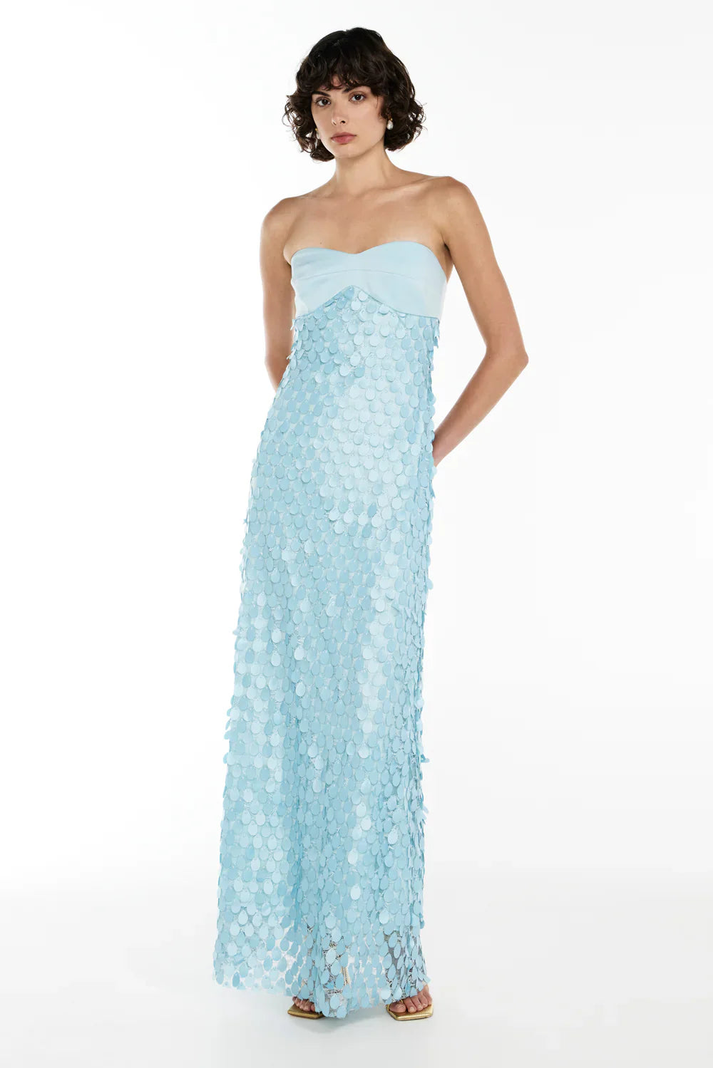 Get ready to turn heads with the Balconette Maxi Dress by Manning Cartell! The crepe satin bodice adds a touch of elegance, while the teardrop lace applique skirt adds a romantic touch. Perfect for any special occasion, this dress will make you feel confident and beautiful.
