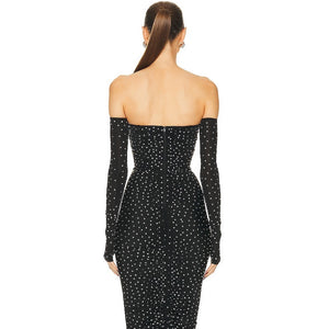 Looking for a show-stopping dress that will make you feel like a star? The Alex Perry Dress has got you covered! Featuring a crystal ruched design and column silhouette, this glove dress will accentuate your curves and add some sparkle to your look. Embrace your inner glamour with this elegant and stylish piece.