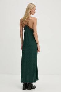 Indulge in utter opulence with the Zadig & Voltaire Risty Silk Dress. Crafted from rich emerald silk, this exquisite maxi dress boasts a charming jacquard wings pattern and intricate lace detailing. The alluring v-neckline, slim non-adjustable straps, and asymmetrical hemline only add to its allure.