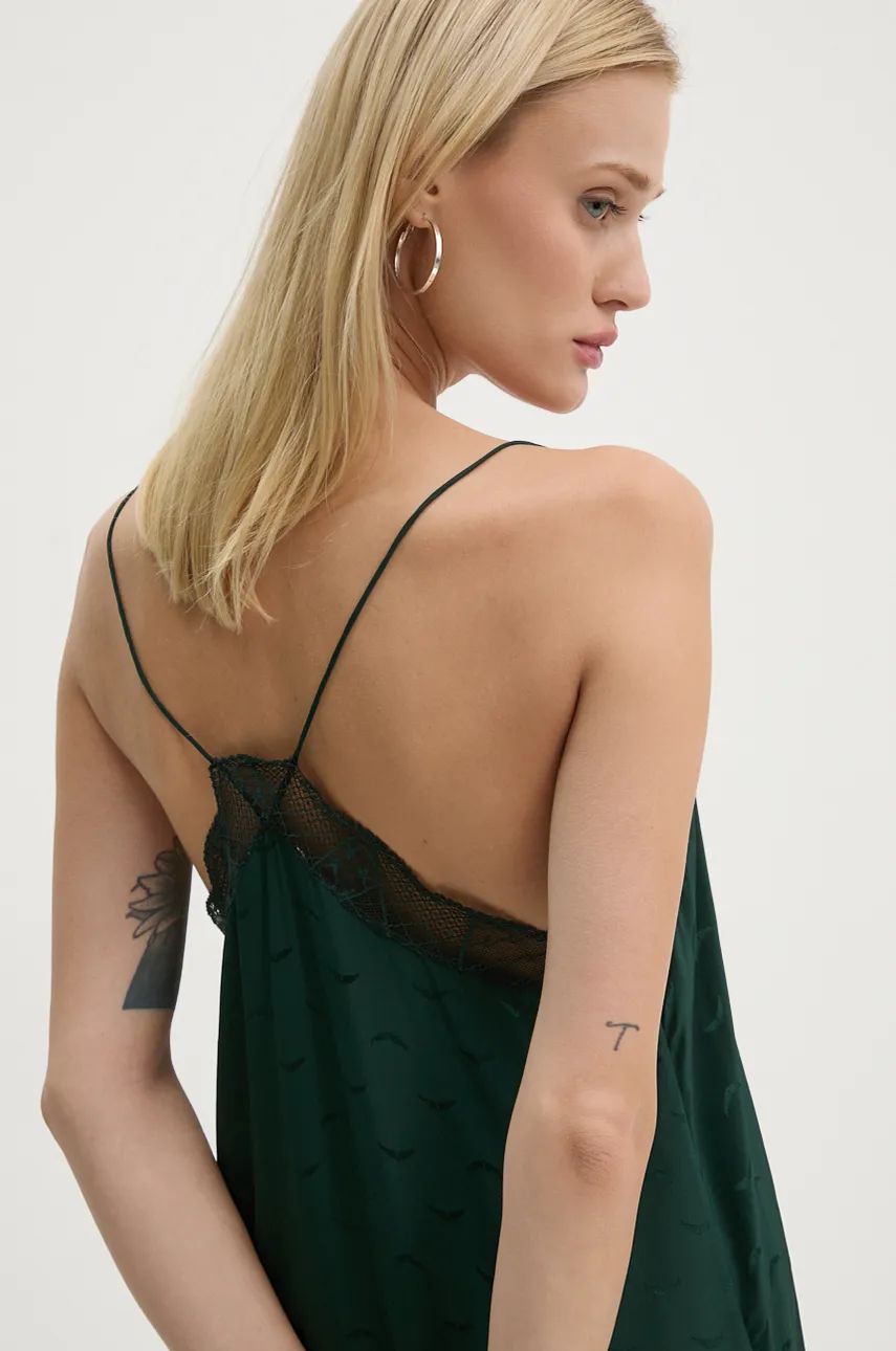 Indulge in utter opulence with the Zadig & Voltaire Risty Silk Dress. Crafted from rich emerald silk, this exquisite maxi dress boasts a charming jacquard wings pattern and intricate lace detailing. The alluring v-neckline, slim non-adjustable straps, and asymmetrical hemline only add to its allure.