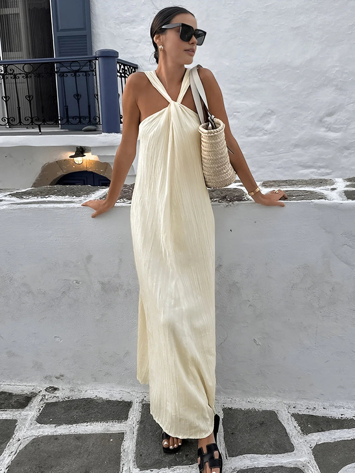 Dress to impress with our Aurora Maxi Dress. With its elegant and beautiful design, this dress is perfect for any occasion. The causal and sexy style features a hanging neck and knot strap, making you stand out in the crowd. Look and feel confident with this solid maxi dress.