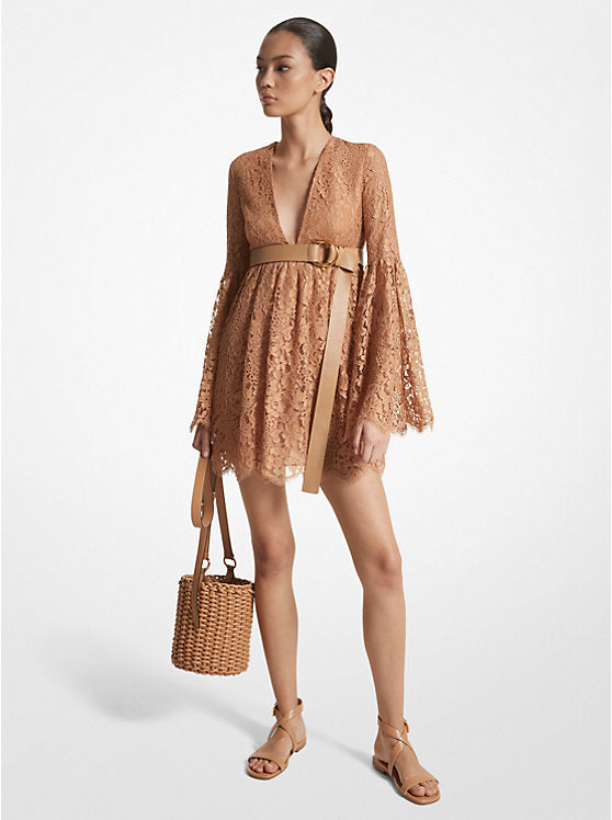 Indulge in vintage glamour with the Floral Lace Flare-Sleeve Empire Dress by Michael Kors. This mini dress features dramatic bell sleeves, an empire waist, and a plunging neckline for a feminine silhouette. Embrace the boho-chic trend by pairing it with delicate sandals and a bucket bag.