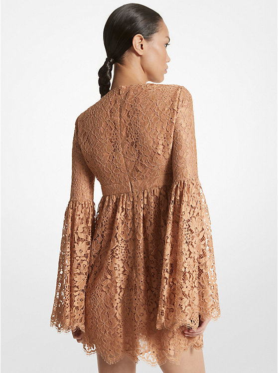 Indulge in vintage glamour with the Floral Lace Flare-Sleeve Empire Dress by Michael Kors. This mini dress features dramatic bell sleeves, an empire waist, and a plunging neckline for a feminine silhouette. Embrace the boho-chic trend by pairing it with delicate sandals and a bucket bag.