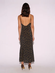 Indulge in the effortless elegance of the Iggy Dress. The 90's inspired slip dress features a flattering ankle length and fish-tail hem, with a scooped bust and low back for a touch of allure. Adjustable back straps ensure the perfect fit, while the bias cut skirt drapes beautifully in 100% silk crepe. No lining needed for a sleek and luxurious feel.