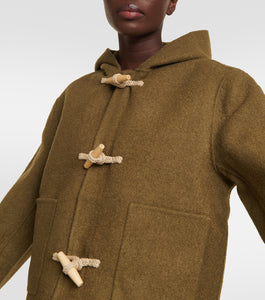 This duffle jacket from Toteme is a timeless addition to your outerwear edit. Made from an olive-hued wool blend, the hooded style features elegant toggle closures and tonal patch pockets.