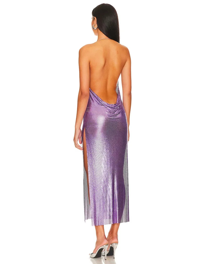 Take a walk on the wild side with the Gigi Dress. Make a statement in this bold and daring metal chainmail dress with a halter neck and side slit. Perfect for an adventurous evening out or a daring prom look. Let your inner risk-taker shine in this purple chain dress!