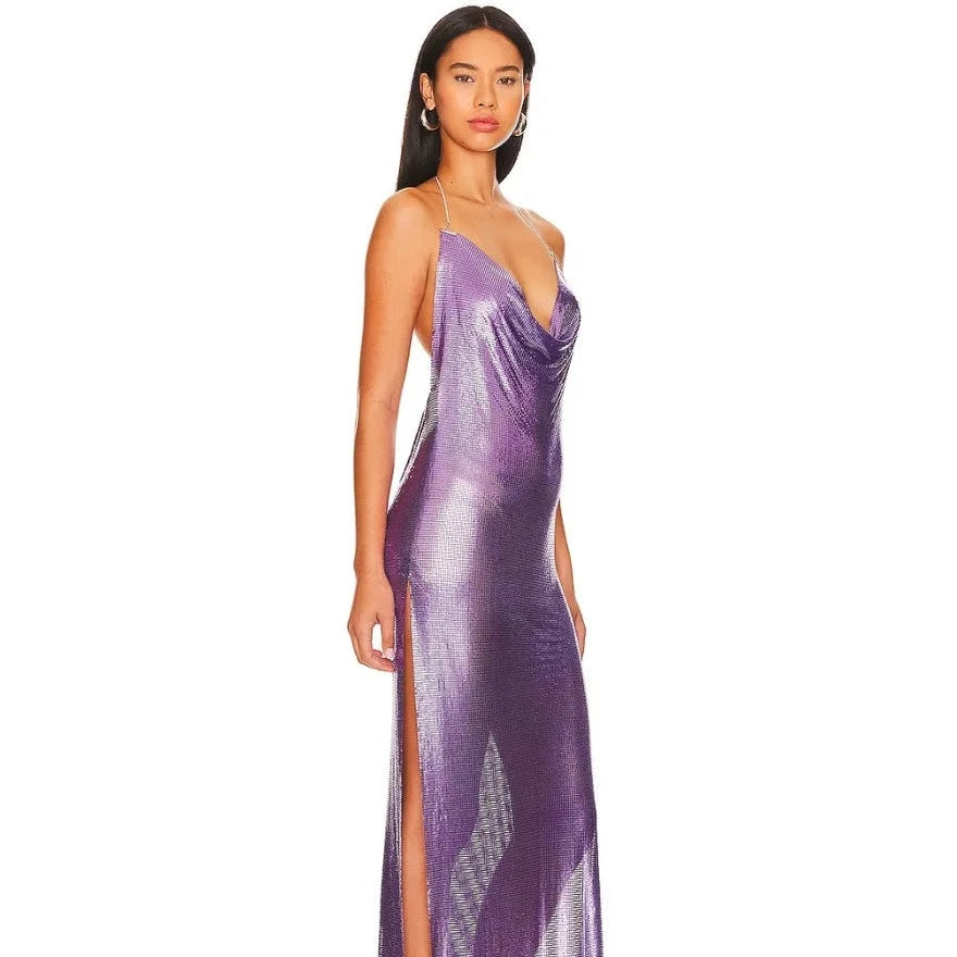 Take a walk on the wild side with the Gigi Dress. Make a statement in this bold and daring metal chainmail dress with a halter neck and side slit. Perfect for an adventurous evening out or a daring prom look. Let your inner risk-taker shine in this purple chain dress!