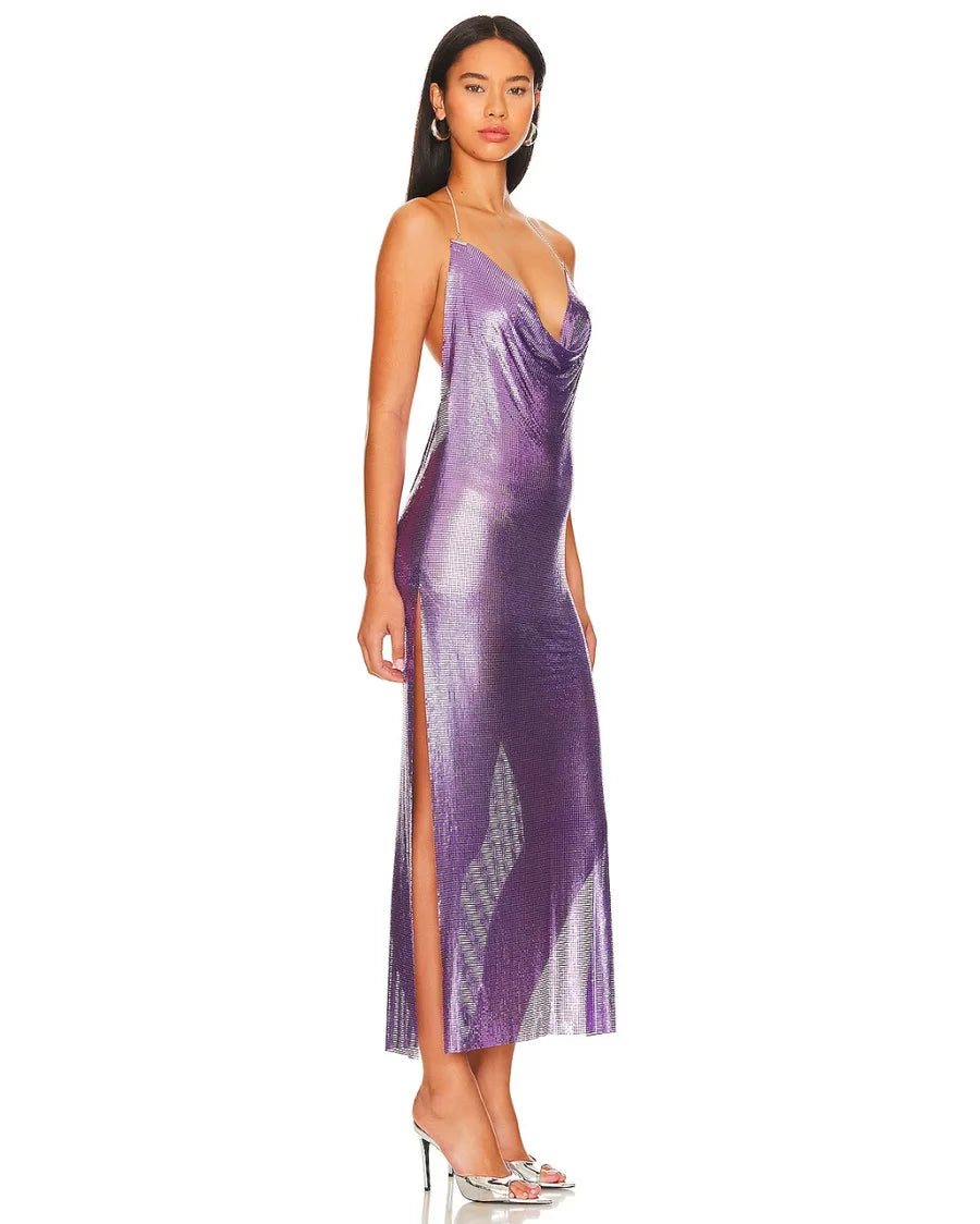 Take a walk on the wild side with the Gigi Dress. Make a statement in this bold and daring metal chainmail dress with a halter neck and side slit. Perfect for an adventurous evening out or a daring prom look. Let your inner risk-taker shine in this purple chain dress!