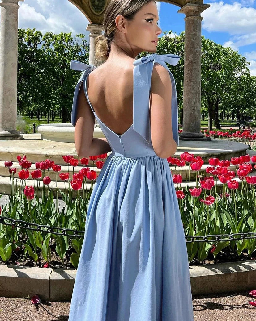 Introducing the Fabiola Dress, perfect for summer! With its sexy loose fit and ankle length, this blue dress will leave you feeling confident and stylish. The sleeveless design and straps add a touch of femininity. Perfect for any occasion, this dress is a must-have in your wardrobe.