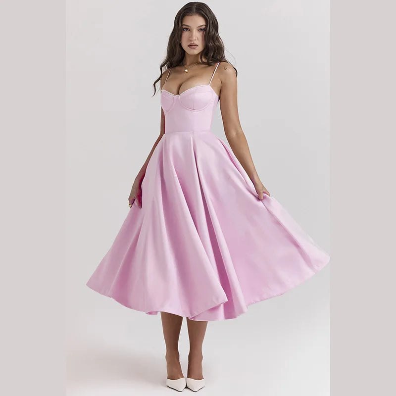 Discover the sophisticated style of the Dress Samaria. This A-line midi dress features a strapless design and elegant spaghetti straps, perfect for formal events or a night out. Its sleek silhouette will flatter any figure, making you look and feel confident. Wear it with your favorite heels for a truly elegant look.