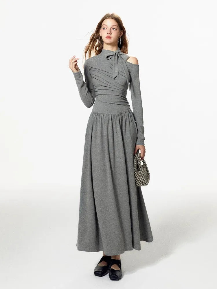 Elevate your wardrobe with our Grey Off Shoulder Pleated Dress for women in autumn and winter. This unique dress boasts a sense of luxury and a flattering slim fit A-line design. Stay stylish and comfortable all season long with Robe Kitty.