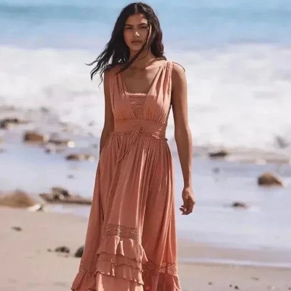 Take on any adventure with the Haze Dress. This sleeveless cotton maxi dress is perfect for the summer beach, with its boho style and solid color design. Stay cool and stylish while enjoying the sun!