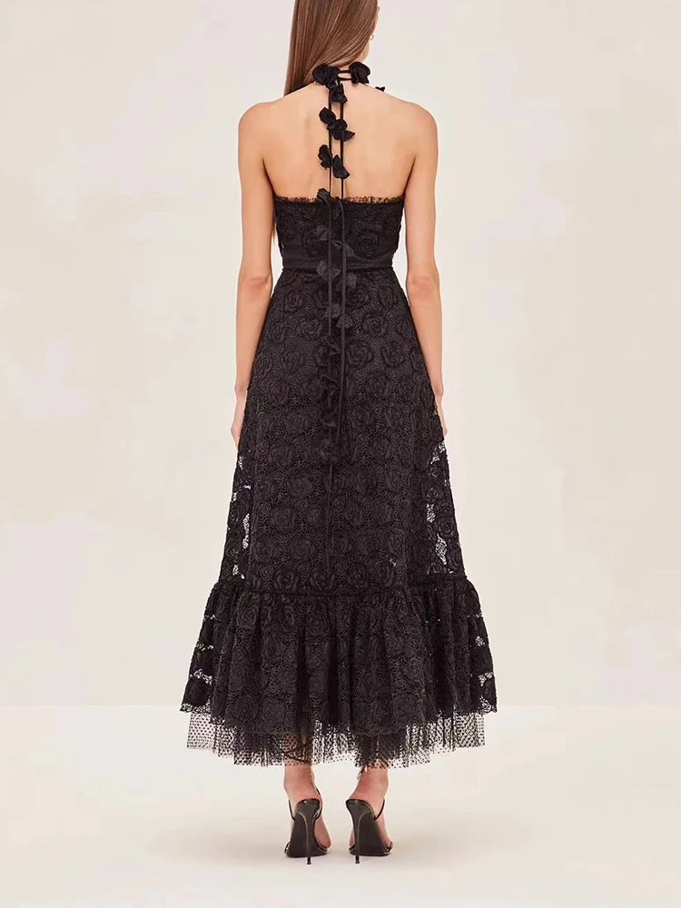 Introducing the Alexis Villanelle embroidered halterneck dress. This elegant dress features a backless design and a sling style, making it perfect for special occasions. With its intricate embroidery, you'll make a statement wherever you go. Experience style and comfort in one with this long dress.