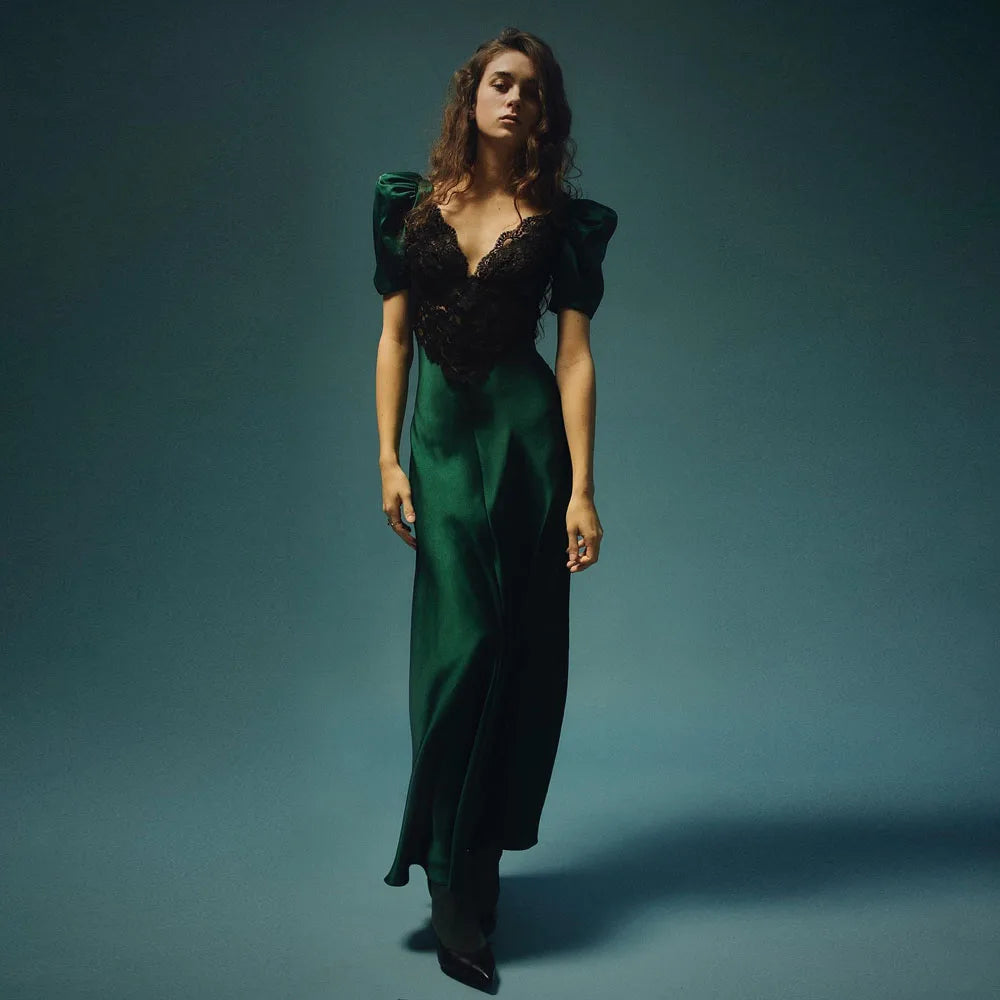 Expertly crafted by Rodarte, this Women's Green Silk Lace Long Dress boasts a stunning design and elegant silhouette. Made of luxurious silk, this dress features delicate lace detailing that adds a touch of femininity. Perfect for any formal occasion, this dress is a must-have for any fashion-forward woman.