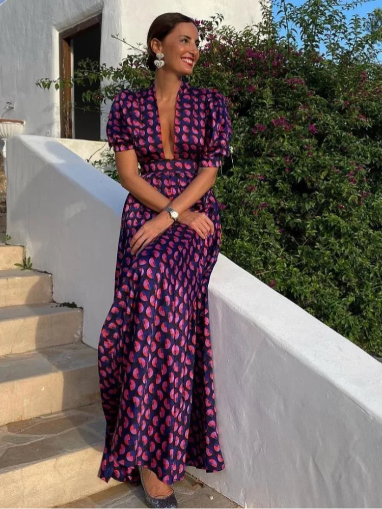 Introducing Alexia's Dress Cotton - the perfect addition to your summer wardrobe. This maxi dress features a beautiful print and flowy fabric, with 1/2 sleeves and a fitted top that flares into a full skirt. From day to night, this delicate dress will effortlessly elevate your style.