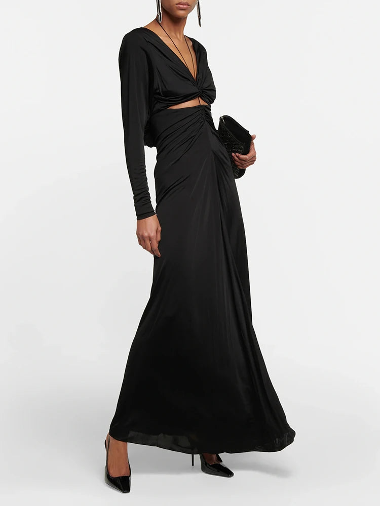 Upgrade your wardrobe with our Dress Fiorella. Featuring a sultry V neckline and cutout design, this long sleeve dress exudes elegance and style. The waist hollow out design flatters your figure, making you the center of attention. Perfect for any formal occasion, this dress is a must-have for any fashion-forward woman.