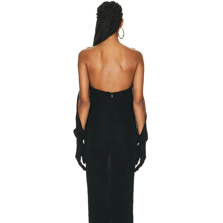 Shake things up with Dress Octavia! This sexy number features off-the-shoulder gloves and a slimming black design, perfect for a guest at a wedding or any elegant party. With its playful and stylish look, you're sure to turn heads and be the life of the party (and don't forget to snag those sneaky glances with the backless design). Get ready to conquer the dance floor in this standout maxi dress!