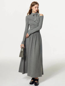 Elevate your wardrobe with our Grey Off Shoulder Pleated Dress for women in autumn and winter. This unique dress boasts a sense of luxury and a flattering slim fit A-line design. Stay stylish and comfortable all season long with Robe Kitty.