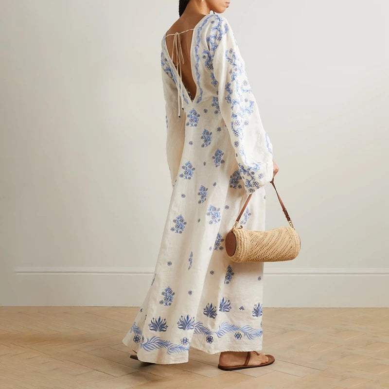 Indulge in the exquisite craftsmanship of the Francisca Tinaja Cutout Embroidered Linen Maxi Dress. This Agua by Agua Bendita creation features cooling linen and intricate floral embroidery, inspired by local flora. With delicate ties ensuring the blouson sleeves stay put, this dress is perfect for a special occasion.