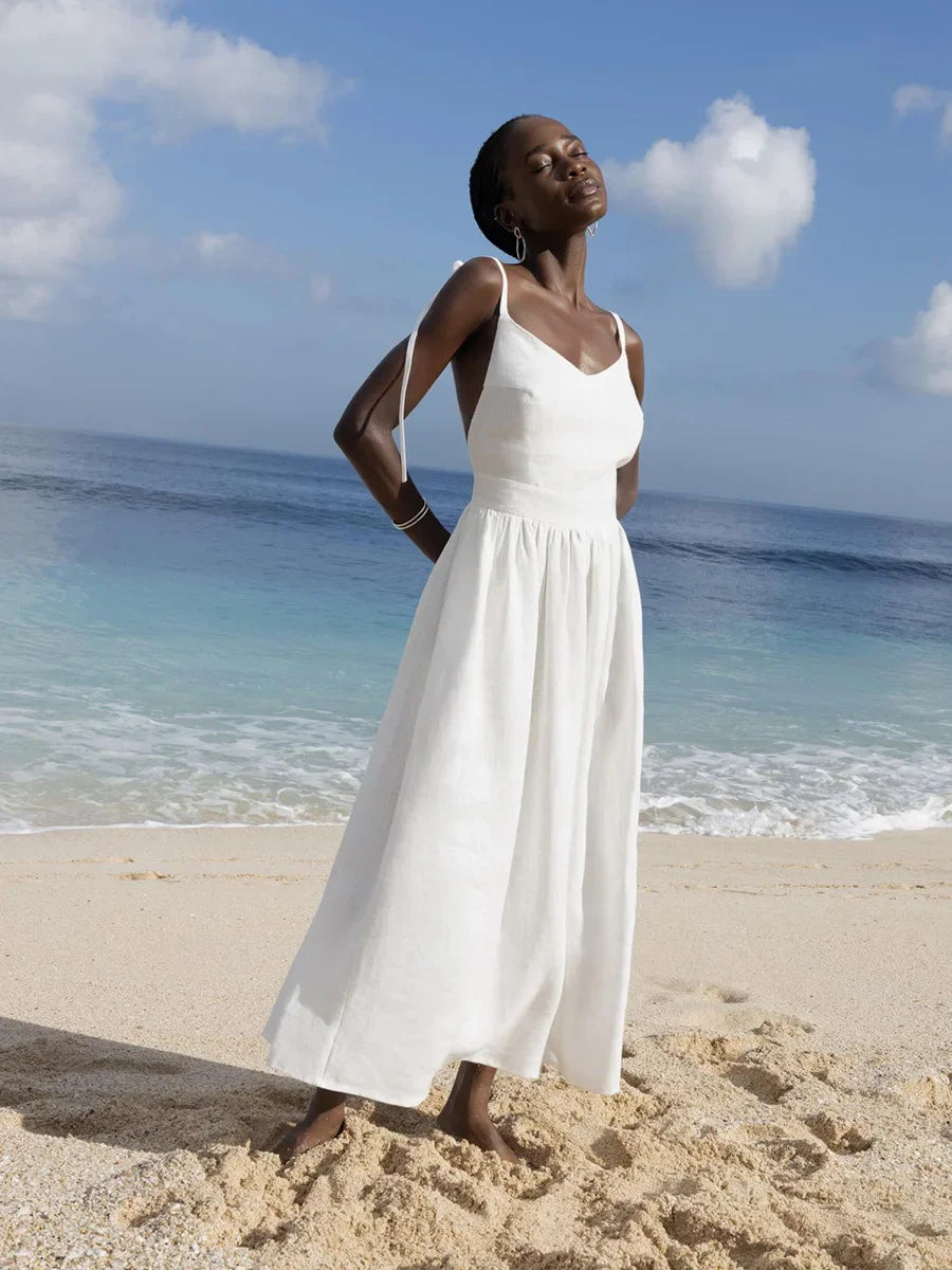 Channel your inner island goddess with the Kilauea Dress - the perfect choice for a sunny day at the beach or a casual stroll on a warm summer evening. Made with lightweight wolfeel material, this vintage-inspired dress boasts an elegant loose A-line silhouette and a delicate sling design for a breezy and effortless look. Experience ultimate comfort and style with the Kilauea Dress.